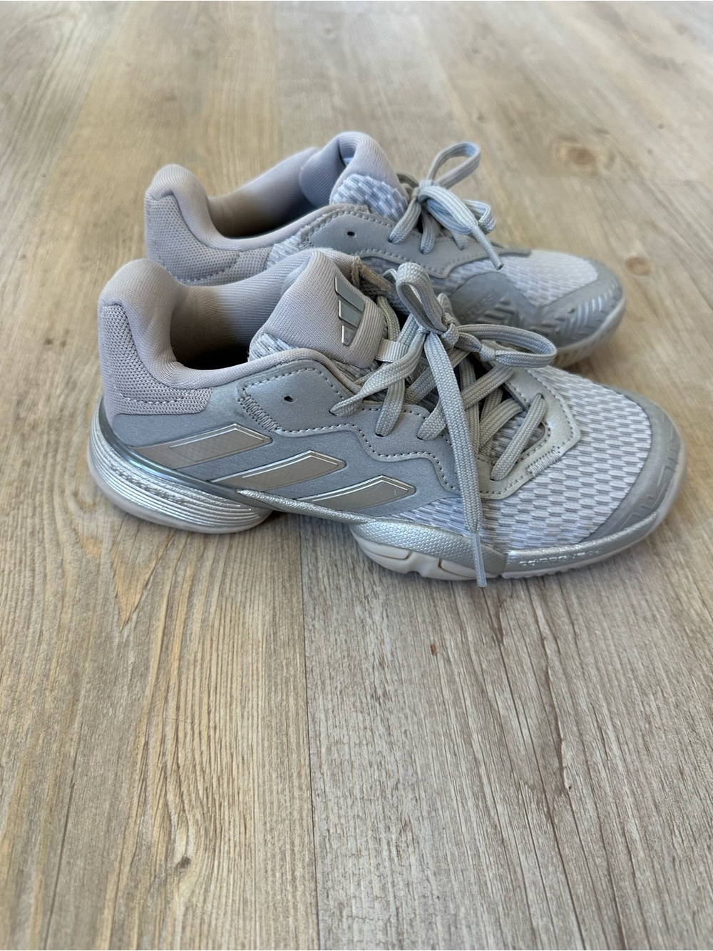 Kids’ Adidas Barricade tennis shoes